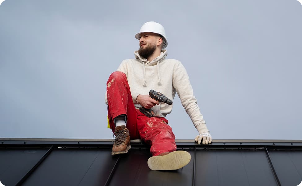 man sitting on the roof